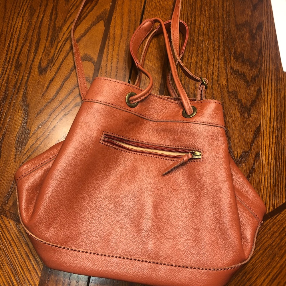 Beautiful burnt orange/brown theSak brand!